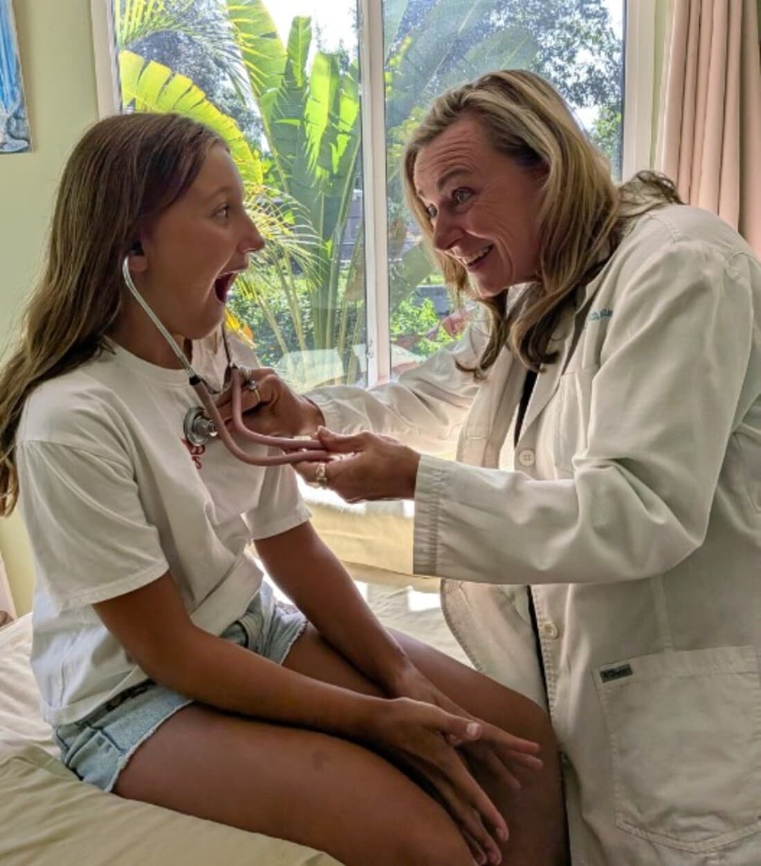 Dr. Lipham sharing a stethoscope moment with Shannon