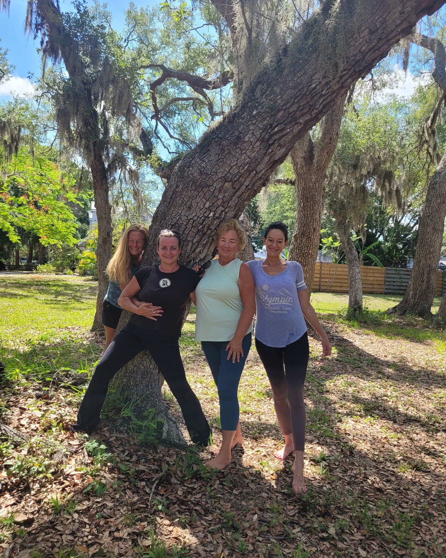 Dr. Jessica Lipham with Qi Gong students gathered outdoors after class